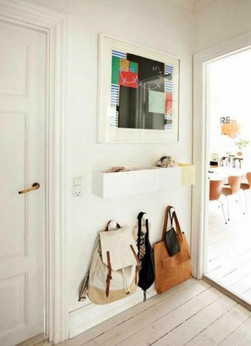 Как оформить прихожую в квартире напротив входной двери. Что можно повесить на стену напротив входной двери: идеи