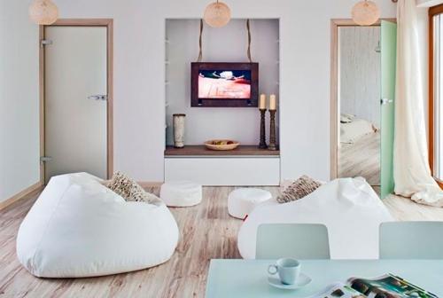 Кирпичные стены в интерьере белые. Белая кирпичная стена в гостиной 23