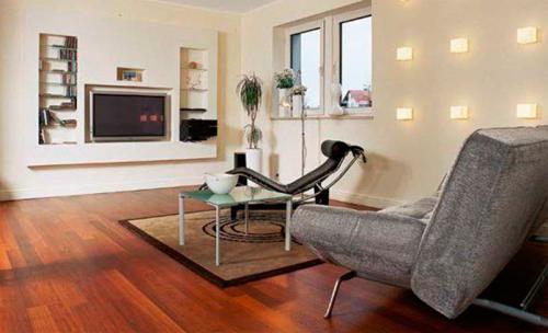 Кирпичные стены в интерьере белые. Белая кирпичная стена в гостиной 22