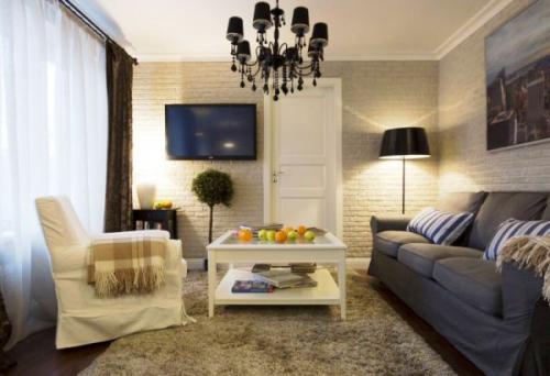 Кирпичные стены в интерьере белые. Белая кирпичная стена в гостиной