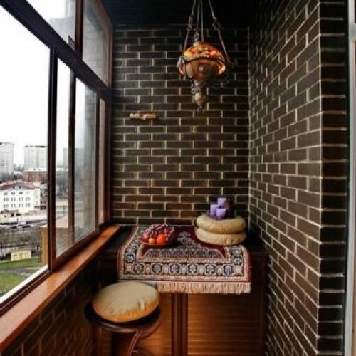 На балконе кирпичная кладка. Особенности отделки декоративным кирпичом 04