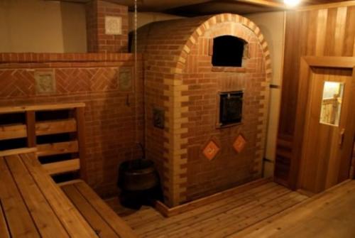 Облицовка печи в бане плиткой. Особенности облицовки банной печки 07