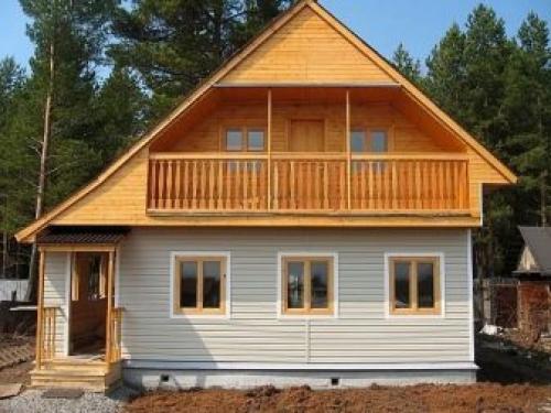 Деревянный фронтон в кирпичном доме. Модификации архитектурных элементов 05