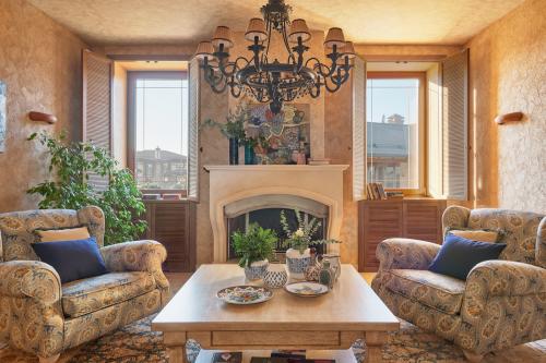 Как красиво оформить гостиную картинами: 5 простых правил 23 Как красиво оформить гостиную картинами: 5 простых правил 23